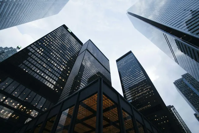 Multiple modern buildings, illustrative